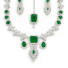 AD Stone jewellery set with green stones in nano setting – necklace, earrings, and maang tikka bridal collection by Tapasvini